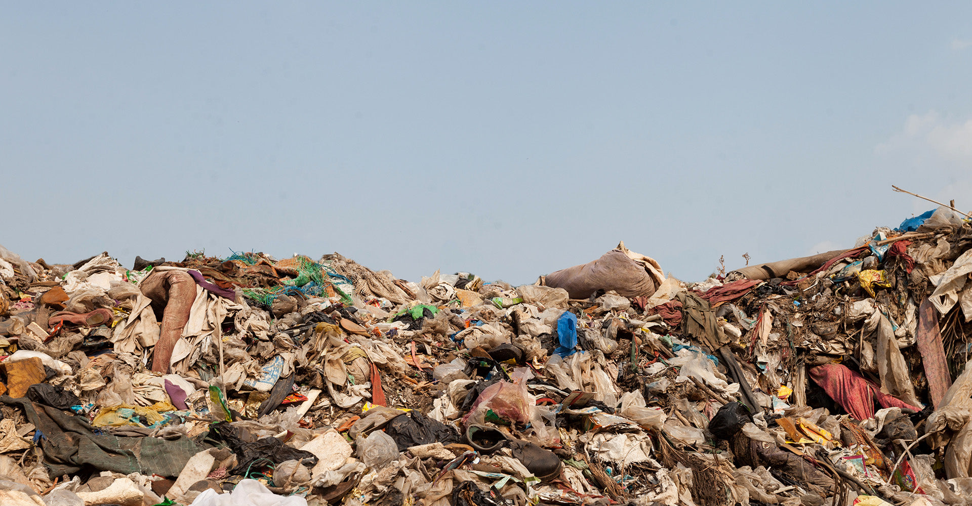 Every second, a truckload of clothes are destroyed. How do we prevent this happening?